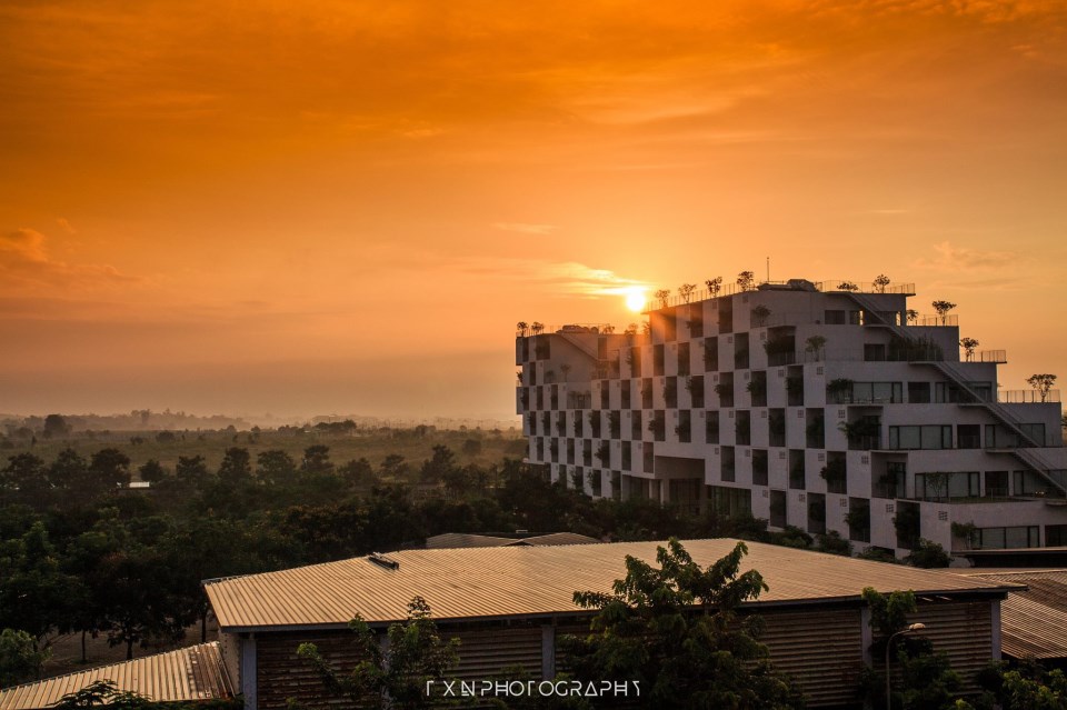 The signal building of Hoa Lac Campus- view from the dormitory. Sunrise in Hoa Lac is always peaceful and gentle. Picture: Truong Xuan Nguyen.